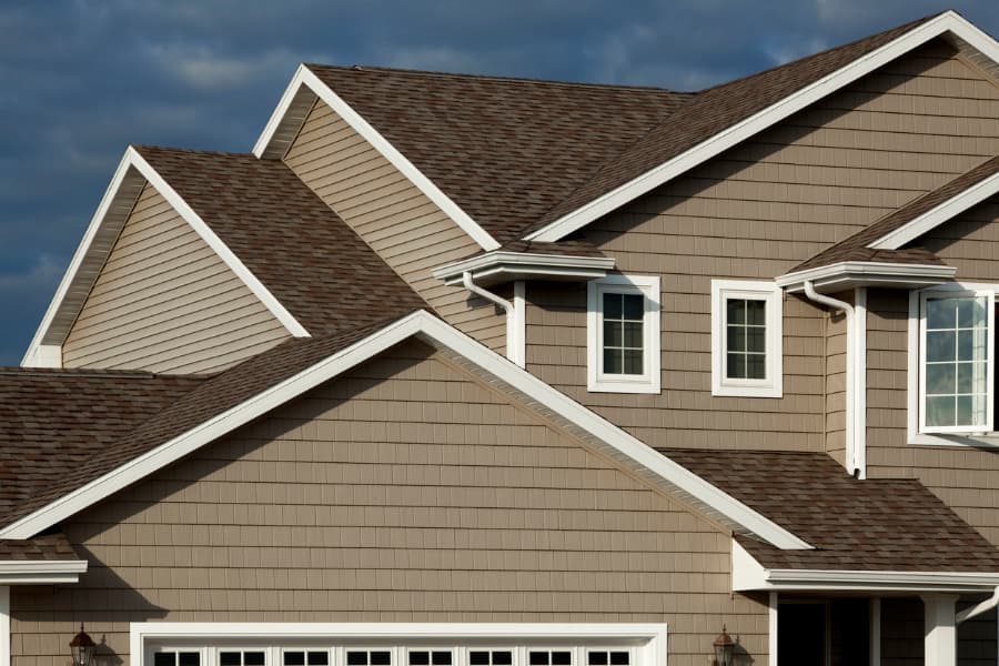 Close-up of vinyl shake siding on exterior of home