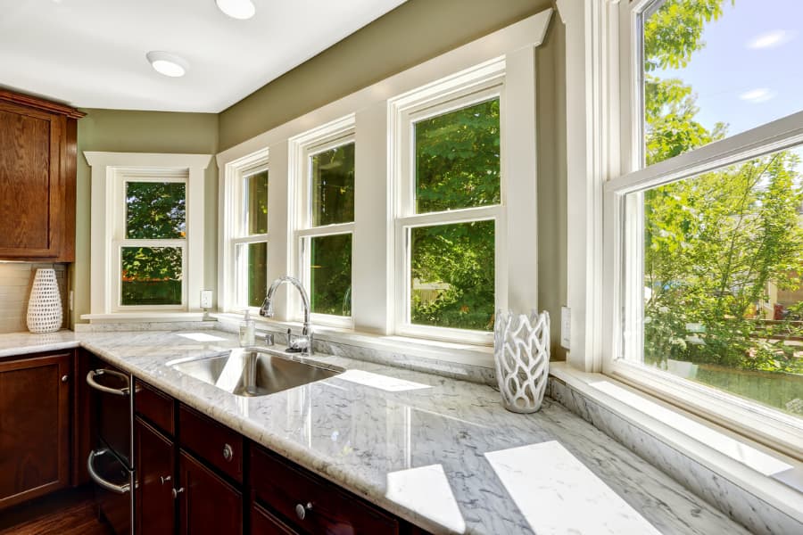 Double-hung windows above kitchen with beautiful natural lighting